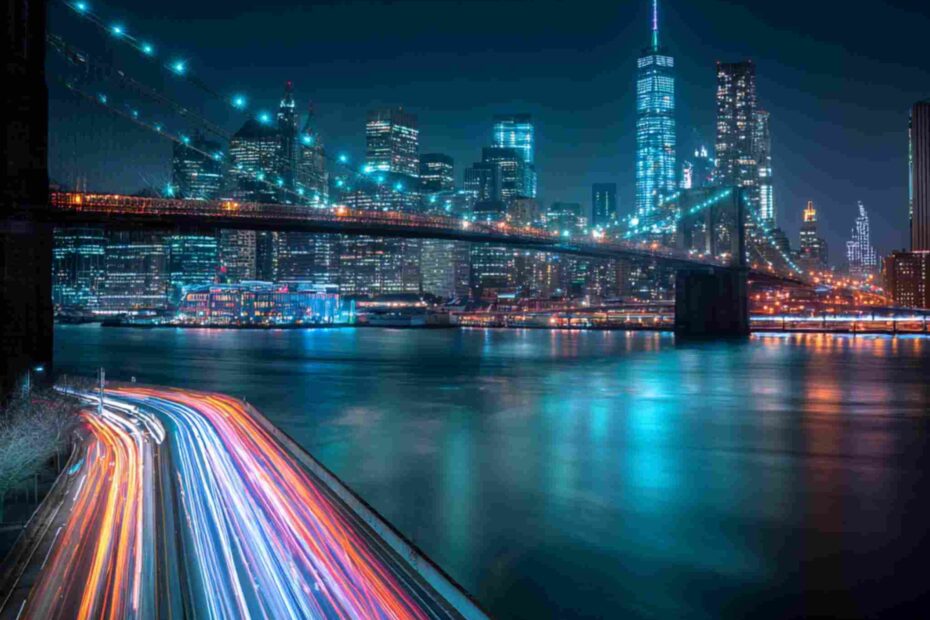 Brooklyn Bridge at night with glowing city lights